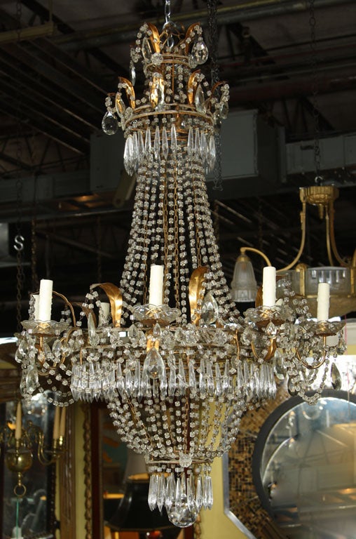 Grand Italian Eight Light, Tole, Gilt Metal and Crystal Beaded Neoclassical Balloon Form Chandelier with a Marie Antoinette Influence; second quarter 20th century